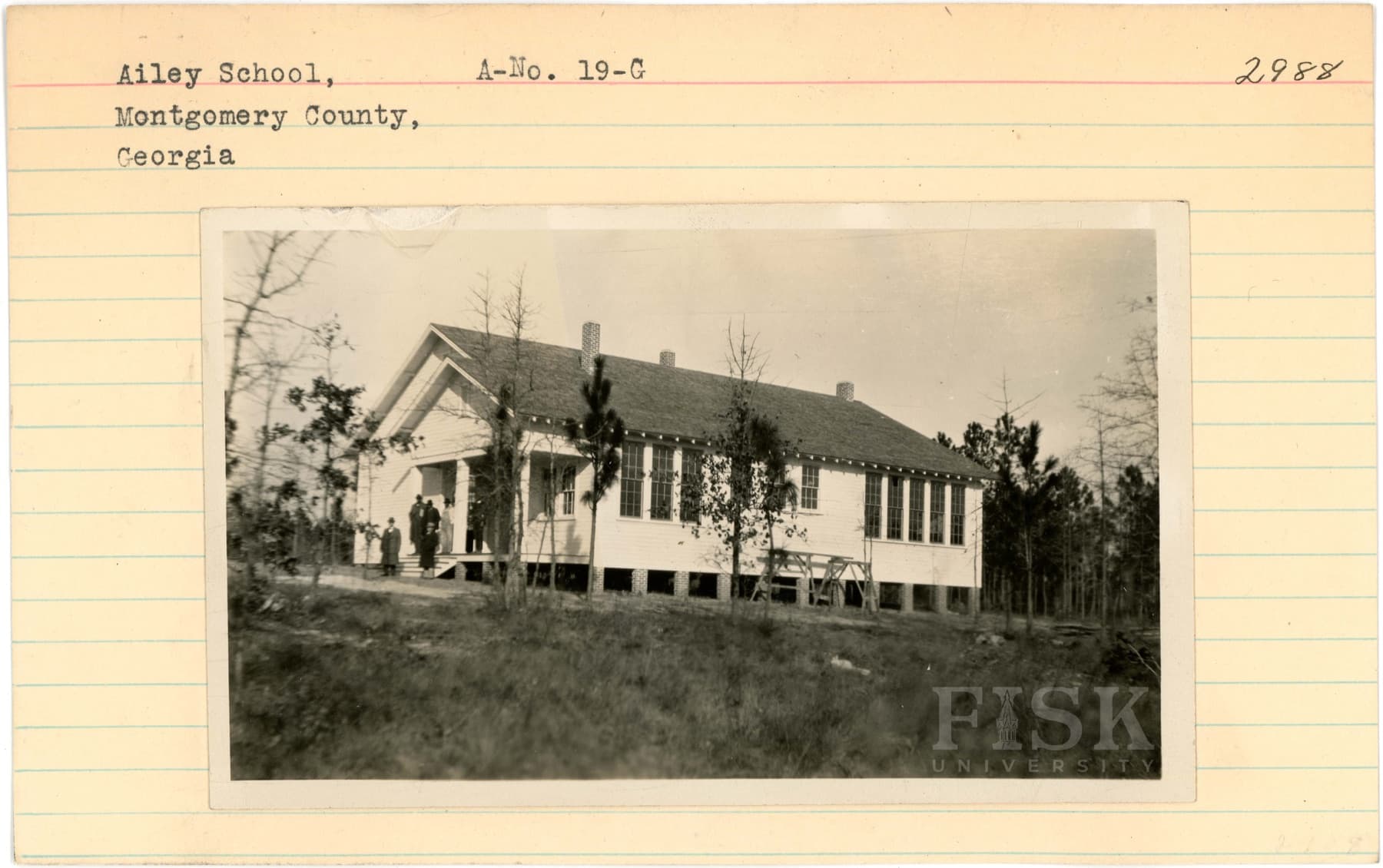 The Ailey School, newly built, photographed in 1928 with members of the community standing on its porch